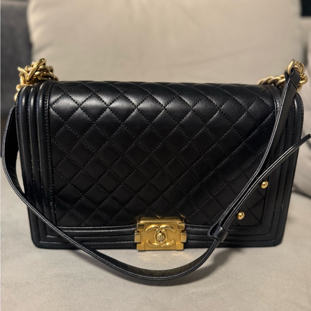 CHANEL Black Quilted Shoulder Bag with Gold Accents